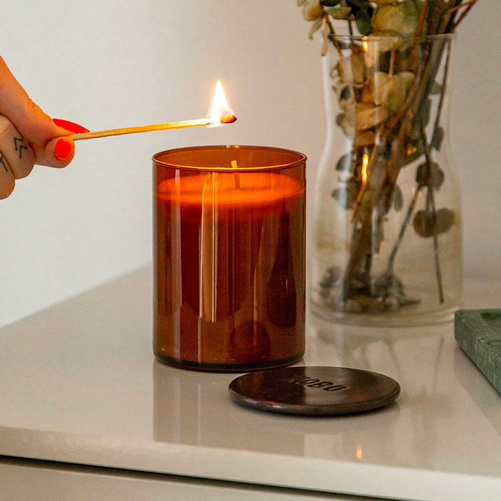 Amber and cedarwood scented candle